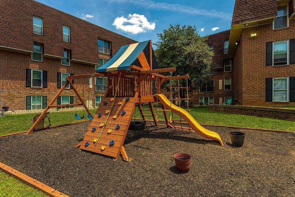 Playground with a yellow slide near 7400 Roosevelt apartments for rent in Northeast Philadelphia